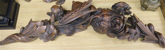 A pair of walnut fruit carvings